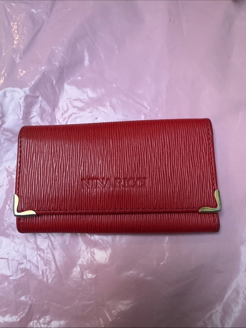 Nina Ricci Red Textured Leather key holder  with Gold Corner Accents